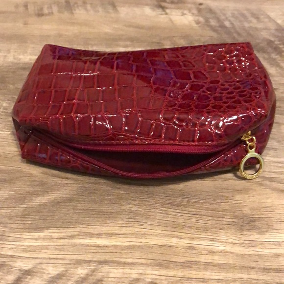 Estee Lauder Handbags - Snakeskin Makeup Bag